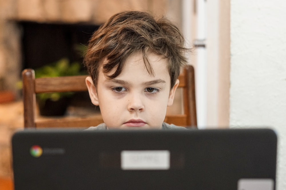 A child using a laptop