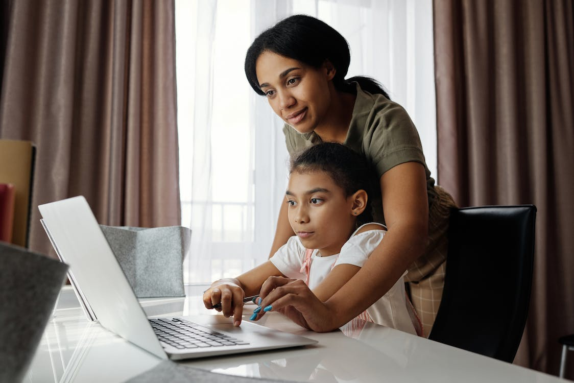 a mother watching a child's online activities
