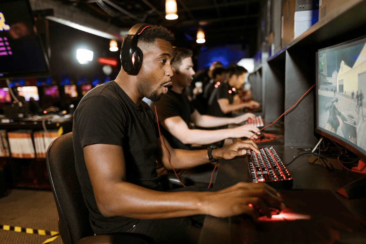 An image of men playing computer games.