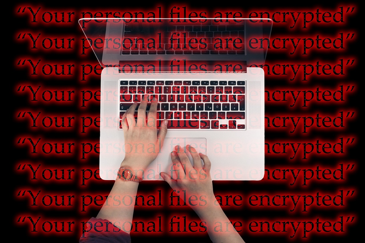 A person using antivirus on a laptop to encrypt their files
