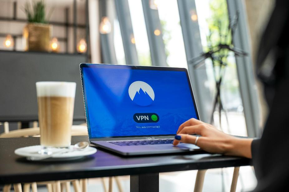 laptop connected to VPN network in a coffee shop