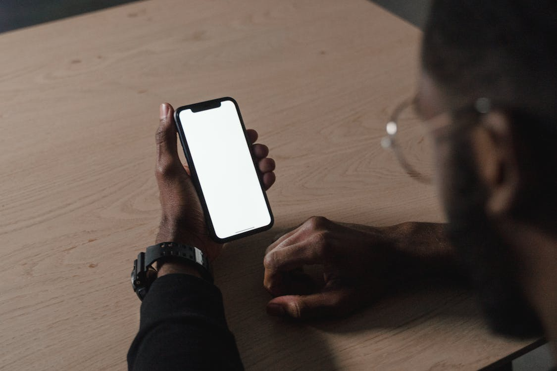 A person looking at the phone screen 