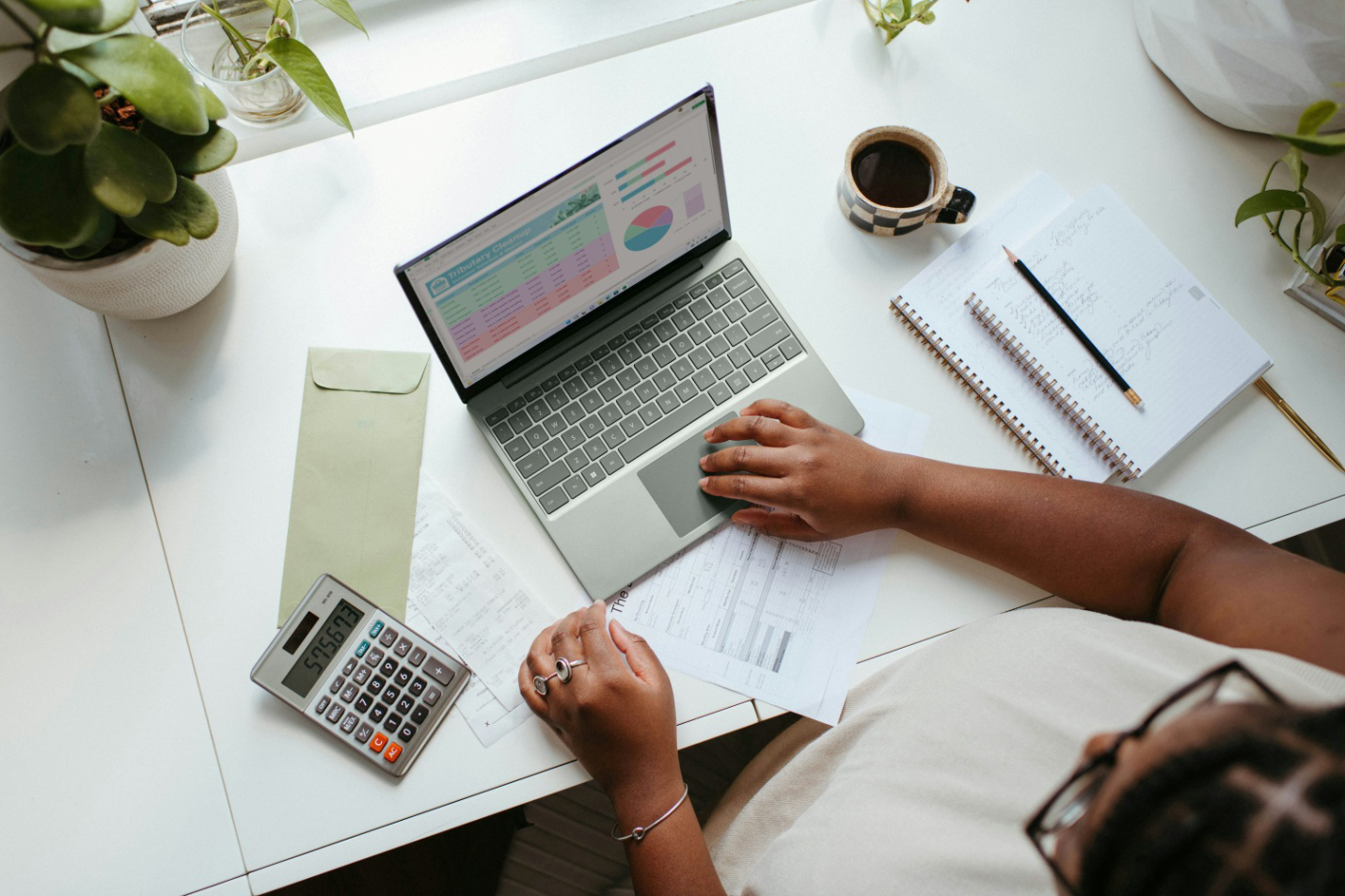  A woman working on a laptop 