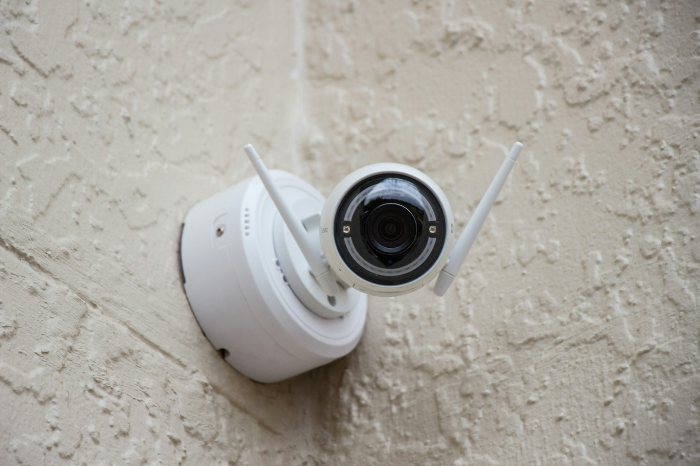 A white security camera