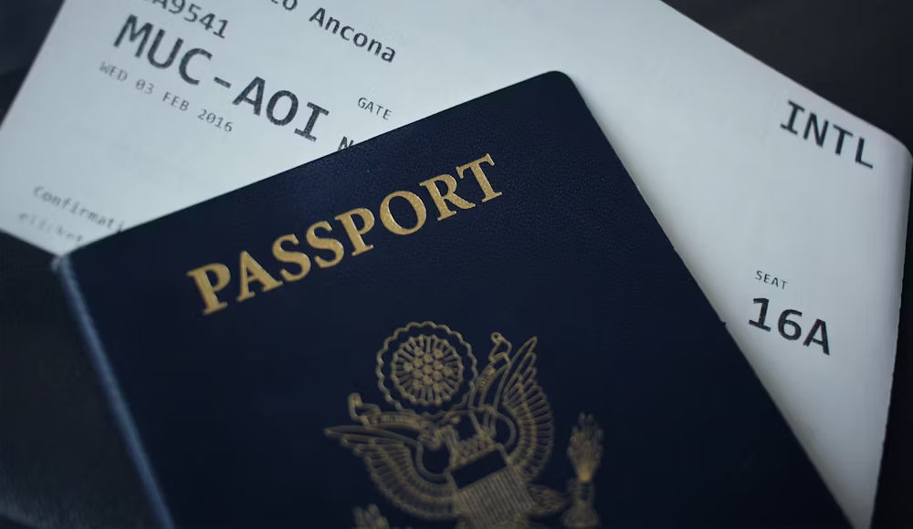 A passport and plane ticket